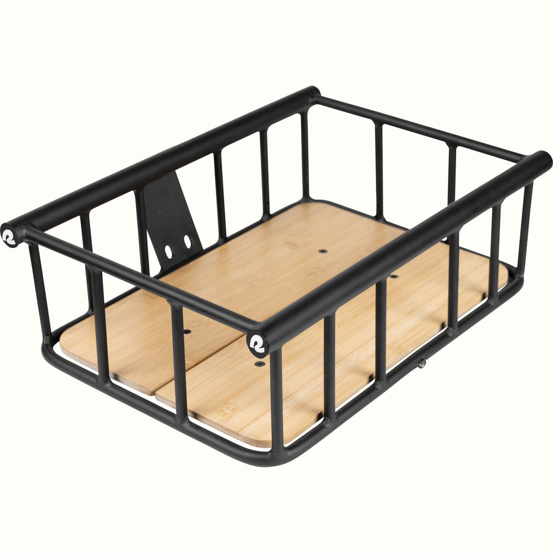 Black metal ebike cargo basket with a wooden base, designed for sturdy storage and easy attachment to an electric bicycle frame.